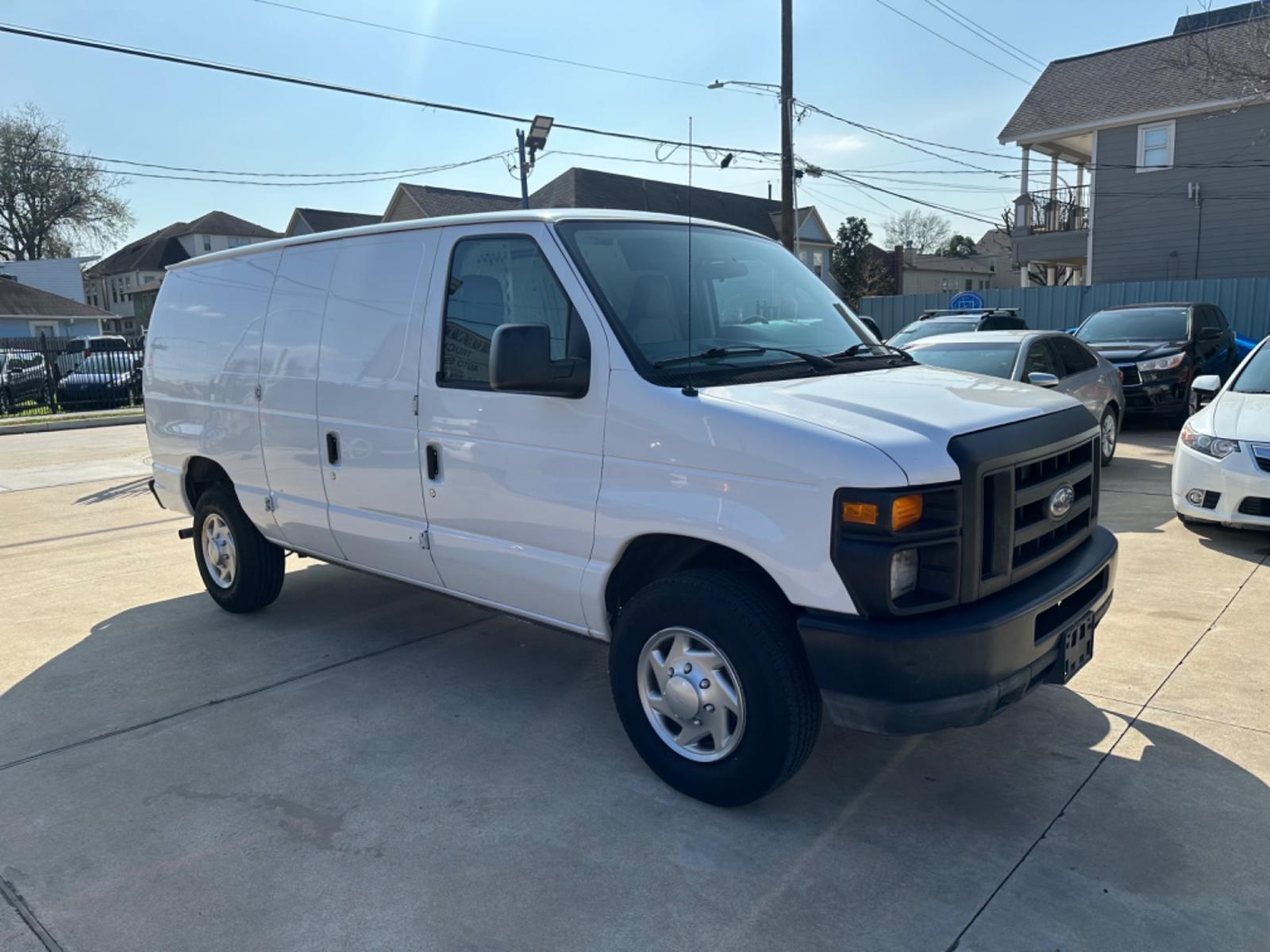 2011 White /Gray Ford E-Series Van (1FTNE2EWXBD) with an 4.6L engine, Automatic transmission, located at 1501 West 15th St., Houston, 77008, (713) 869-2925, 29.797941, -95.411789 - Photo #1